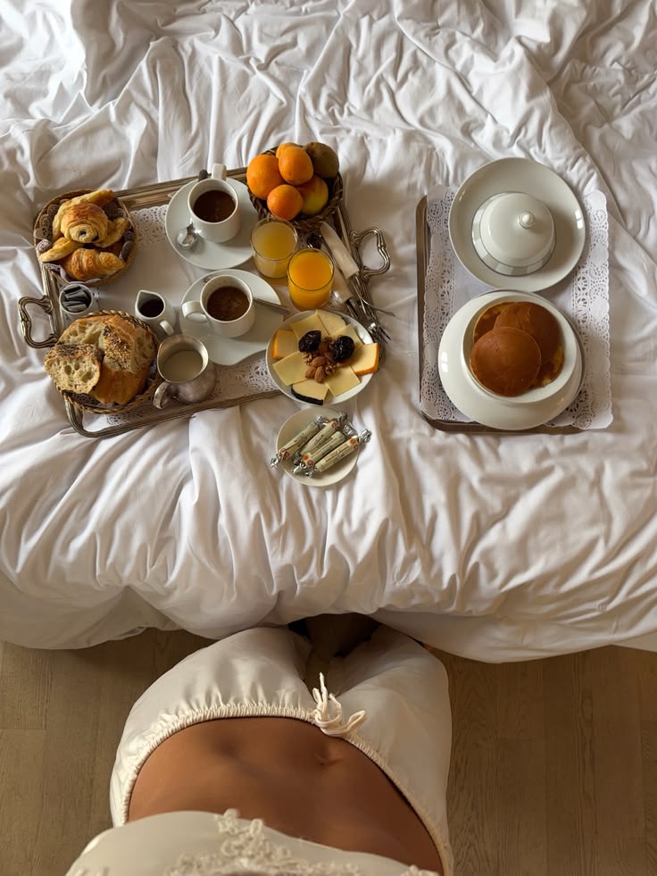 A woman eating breakfast outdoors on a bright morning